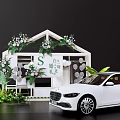 Commercial Wedding Decoration Equipment With White Floral Structure Green Plants And Service Car