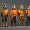 Four People Wearing Orange Black Outdoor Jackets With Helmets Goggles And Climbing Gear