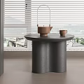 Modern Round Side Table with Wavy Black Base and Tea Set by Window View 3d model