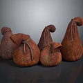 Brown Pear Shaped Textured Cloth Bags With Drawstring Closure In Various Sizes On Dark Background