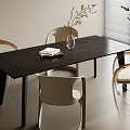 Modern Dark Wooden Table And Chair Set With Vase And Plants In Interior