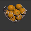 Fresh Ripe Oranges in a Metal Wire Basket on Reflective Surface