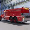 Red Fire Truck Parked In Industrial Warehouse With Metal Structure And Spacious Interior