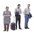 Group of people with luggage adjusting clothes and holding coats