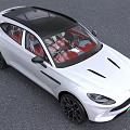 Aston Martin White SUV With Black Roof Sleek Design Black Grille And Green License Plate