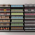 Display Shelves with Various Colored Bottles Neatly Arranged in Retail Store