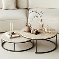 Round Marble Top Coffee Tables With Black Metal Frame And Decorative Items
