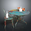 Outdoor Metal Round Table And Chair With Colorful Rustic Design Ceramic Pots Spray Bottle Teapot