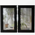 Black Casement Windows with Built in Blinds and Green Plants View Outside for Modern Home