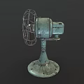 Vintage Electric Fan with Metal Cage Worn Green Base and Retro Design