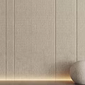 Light Colored Wall Panels With Textured Vertical Lines Bottom Light Strip And Round Beige Decor