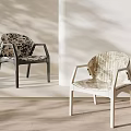 Two Stylish Floral Fabric Upholstered Leisure Arm Chairs For Warm Minimalist Home Living Space
