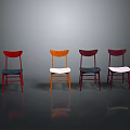 Colorful Set Of Four Dining Chairs With Different Back And Seat Colors