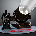Batman Standing Next to Bat Signal With Red Bat Symbol on Ground