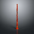 Shiny Red Clarinet Instrument Standing Upright With Glossy Finish Against Grey Background