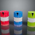Colorful Oil Drums With Red Blue Green Hues White Stripes And Black Triangle Symbols