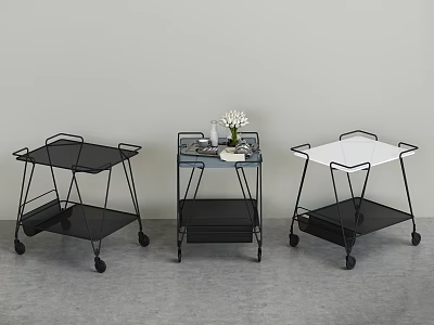 Three Modern Rolling Carts With Black White Tabletops And Metal Frames 3d model