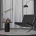 Modern Black Leather Leisure Chair with Tufted Backrest Side Table Decorative Plants and Floor Lamp