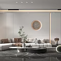 Modern Living Room Interior Design With Sofa Cushions Circular Wall Decor And Green Plant
