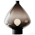 Modern Teardrop Shaped Table Lamp With Transparent Glass Shade And Black Base
