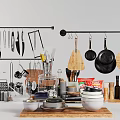 Organized Kitchen Utensils with Hanging Pans Knives Cutting Boards and Spice Bottles