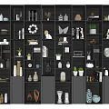 Modern Decorative Cabinet With Multiple Shelves Books Vases Decorative Items And Green Plants