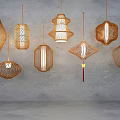 Stylish Woven Pendant Lights With Geometric Shapes And Warm Glow Hanging Against Gray Background