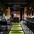 Young Blood Cafe Interior With Art Paintings Pendant Lights Blue Chairs And Green Floor Decor