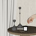 Sleek Silver Metal Candle Holders With Match Lighting Candle For Home Decor