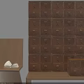 Wooden Storage Cabinet With Multiple Drawers And Open Book On Side