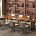 Elegant Modern Wooden Tea Table and Chairs with Light Cushions in Study Room with Bookshelves