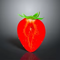 Fresh cut strawberry with red flesh and green leaves on dark reflective surface