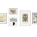 Framed Artworks in Various Styles Hanging on White Wall for Home Decor