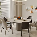 Modern Minimalist Round Dining Table Set With Mixed Color Chairs Fruit Bowl And Wall Art