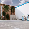 Electric Vehicle Charging Stations In Parking Lot With Red Brick Building And Green Vines