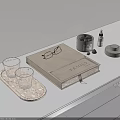 Decorative Ornament Set Featuring Beige Box Black Jar Small Bottle Glass Cups On Stone Tray