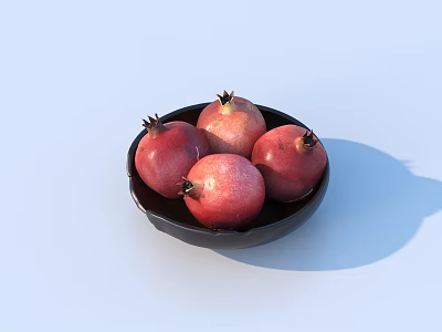 Fresh Ripe Red Pomegranates In Black Bowl On Light Blue Background 3d model