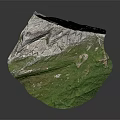 Lush Green Meadow with Scattered Stones in Natural Landscape Against Gray Mountain Cliff