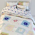 Double Bed With Colorful Patchwork Bedspread Floral Patterned Pillows And Soft Quilted Design 3d model