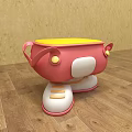 Pink And Yellow Children's Chair With Shoe Shaped Base And Decorative Buttons