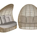 Pair of Egg Shaped Woven Rattan Leisure Chairs with Light Colored Cushions and Pillows