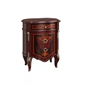 Elegant Antique Wooden Bedside Table With Ornate Carvings And Metal Accents
