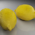 Two Fresh Yellow Lemons with Smooth Skin Placed on Gray Surface