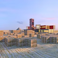 Straw Bales Arranged in Field With Modern Architectural Buildings and Tower
