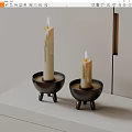 Modern Minimalist Candle Holders with Black Tripod Base and White Candles on White Table
