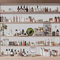 Elegant Perfumes And Cosmetics Display On Multi Layer Shelf With Various Bottles