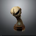 Hand Sculpture With Bronze Texture Holding Light Colored Egg On Brown Base