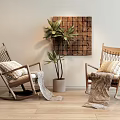 Wooden Rocking Chairs With Woven Design In Interior Featuring Potted Plant And Decorative Art