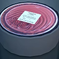 Creamy Chocolate Raspberry Ice Cream With All Natural Ingredients In Round Container