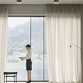 Cream Colored Floor Length Curtains By Window With Mountain Lake View And Floor Lamp